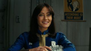 Ella Purnell wearing a Pip-Boy in Fallout